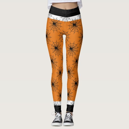 Halloween spinnenweb zwart en sinaasappel leggings (Voorkant)