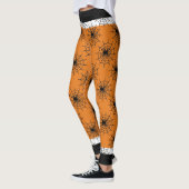 Halloween spinnenweb zwart en sinaasappel leggings (Links)