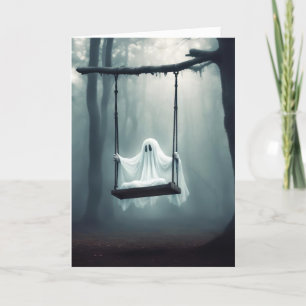Halloween spook op een schommel feestdagen kaart