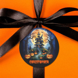 Halloween spookhuis met pompoennaam ronde sticker