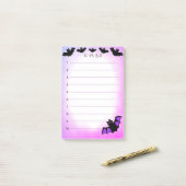 Halloween vliegende vleermuizen op paarse & witte post-it® notes (Op bureau)