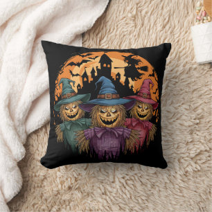 Halloween vogelverschrikker trio onder een spookac kussen