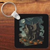 Halloweenhuis met pompoenen en volle maan sleutelhanger (Voorkant)