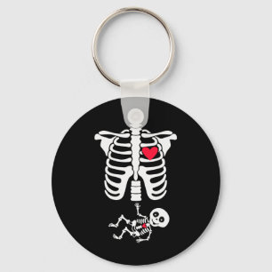 Halloweenkostuum voor zwangere moeder om skelet te sleutelhanger