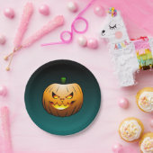 Halloweenpompoen op een papieren bord (Feest)