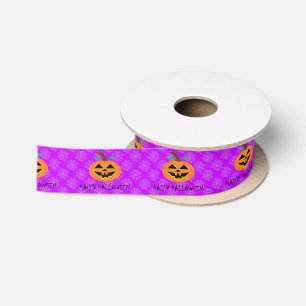 Halloweenpompoen op paarse satijnen lint