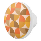 Halve cirkels Oranje en bruin uit de midden van de Keramische Knop (Rechts)