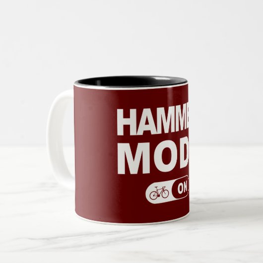 Hammermodus ingeschakeld tweekleurige koffiemok (Voorkant links)