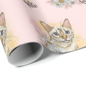 Hand die een grappige sneeuwbengaals kat maakt met cadeaupapier (Rol Hoek)