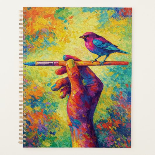 Hand die een penseel vasthoudt met vogel creatief planner (Voorkant)