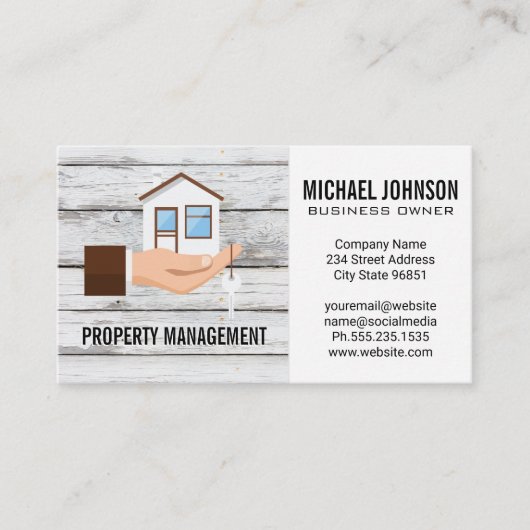Hand die huislogo vasthoudt visitekaartje (Voorkant)