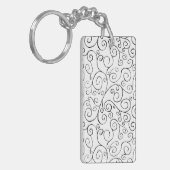 Hand-geschilderd zwart valpatroon op wit sleutelhanger (Voorkant Links)