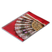  Hand Held Fan op een rode achtergrond Notitieboek (Linkerzijde)