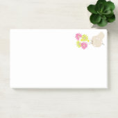 Hand houdt bloemen vast post-it® notes (Kantoor)