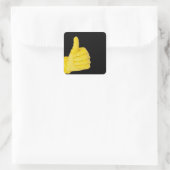 hand in gele latexhandschoen vierkante sticker (Tas)