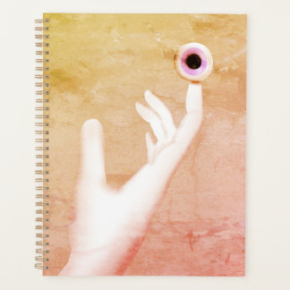 Hand met oog planner