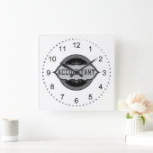 Handelaar met poppenborden vierkante klok (Huis)