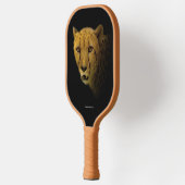 Handelspans met een Magnificante Cheetah Pickleball Paddle (Links)