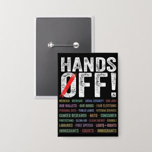 Handen af van protest button