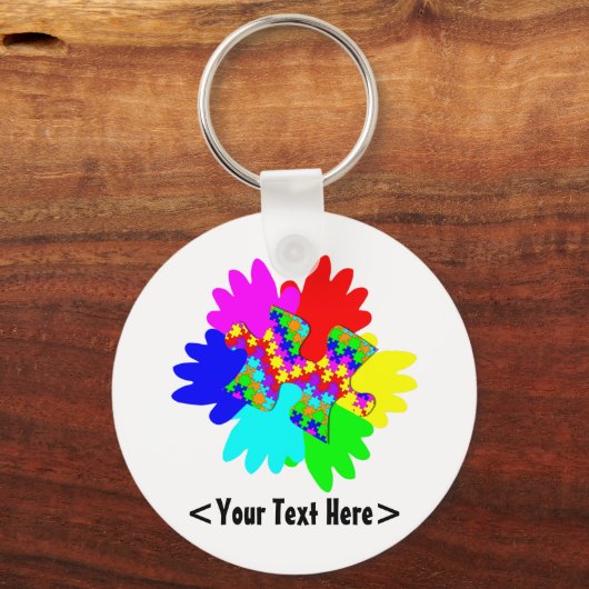  handen en puzzelstukjes sleutelhanger (Voorkant)