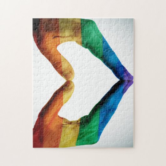 Handen schilderd als regenbooghart legpuzzel (Verticaal)