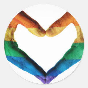 Handen schilderd als regenbooghart ronde sticker