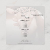 Handen van een gekleurd bruiloft paar met ring informatiekaartje (Achterkant)