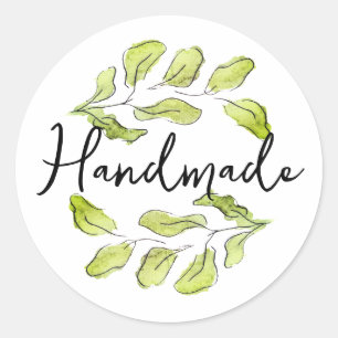 Handgemaakt met groene waterverf bladeren ronde sticker