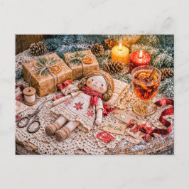 Handgemaakte stoffen pop met kerstcadeaus en knus briefkaart