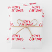 Handgeschreven pretkerst in rood inpakpapier vel (In situ)