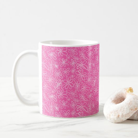 Handgetekende bloemen op heet roze koffiemok (Met donut)