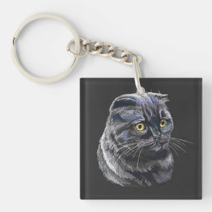 Handgetekende grappige pluizige Britse zwarte kat. Sleutelhanger