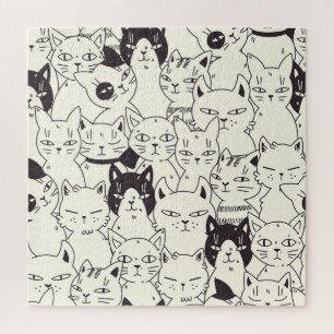 Handgetekende katten doodle naadloos patroon. legpuzzel