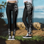 Handgetekende Zwart-wit Bloemen Leggings<br><div class="desc">Bekijk deze prachtige zwarte leggings gemaakt met een wit bloemmotief dat aan beide poten zijkanten en een beetje aan de achterkant en voorkant stroomt. Er staat een citaat "Life is you" op een been die je kunt veranderen, ook op de voorkant kan AD Studio worden veranderd in jouw naam of...</div>