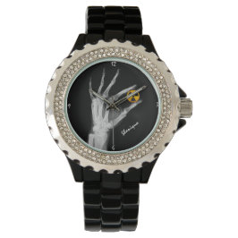 Handje dat een radiatiesymbool vasthoudt horloge