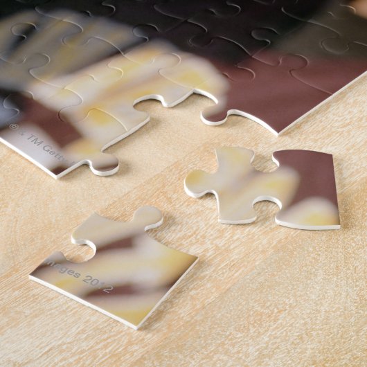 Handje op een Lacrosse Stick Legpuzzel (Zijkant)