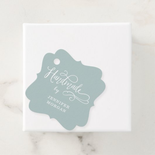 handmade whimsical script monogram product label (In situ)