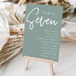 Handmatige scripttabel SEVEN   gastnamen Kaart<br><div class="desc">Eenvoudige en chic table number cards in Eucalyptus Green en white maken een elegante verklaring bij uw bruiloft of gebeurtenis. Het ontwerp kenmerkt "lijst [aantal]"in een eyecatching mengeling van klassieke serif en handgeschreven manuscript het schrijven, met individuele gastnamen onder. Het ontwerp herhaalt zich aan beide zijden. Afzonderlijk genummerde kaarten worden...</div>