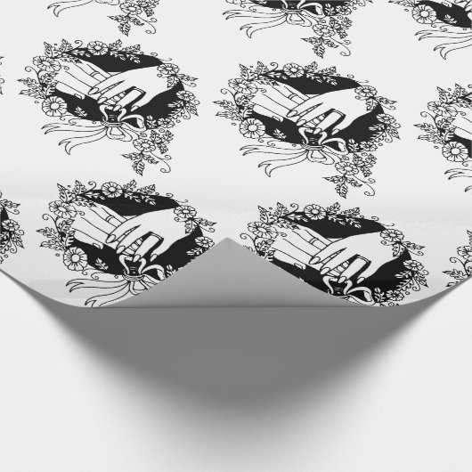 Hands in huwelijksverkrachtingspapier cadeaupapier (Hoek)