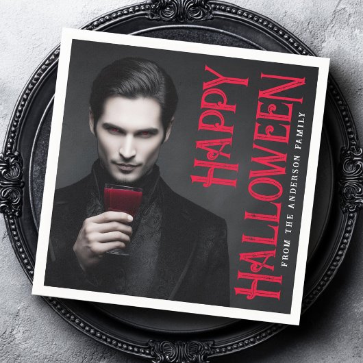 Handsome vampire drinking blood Halloween party Servet