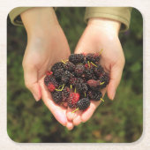 handvol met meerbessen, vers en zoet kartonnen onderzetters (Voorkant)