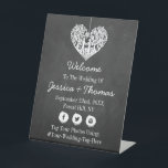 Hangend Collectie van de Hart Tree Chalkboard Wedd Reclamebord Met Voetstuk<br><div class="desc">Dit huwelijksonthaal heeft een romantische hangende boom, en binnenkort man en vrouw, die is gesneden in de vorm van een hart. De achtergrond van het krijtbordeffect maakt deze zitgrafiek perfect voor elk stel dat een romantische bruiloft plant. Dit welkomstbord kan gemakkelijk worden aangepast aan uw feestbehoeften en zal geweldig werken...</div>
