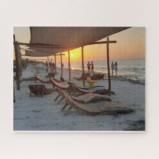 Hangmatten bij de zee bij zonsondergang legpuzzel