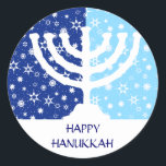 Hanukkah Menorah Sticker<br><div class="desc">Een witte afbeelding Chanoeka menorah zit tegen een winterblauwe achtergrond op deze sticker. Twee tinten blauw voegen contrast toe aan de sneeuwvlokken en sterren van de achtergrond. Voeg hieronder je eigen aangepaste Chanoeka-bericht toe en begin dit label op alles te plakken! Verkrijgbaar in overeenkomende verzendkaarten en andere gunsten.</div>