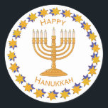 Hanukkah Menorah stickers<br><div class="desc">Een gouden menora omringd door een cirkel gouden & blauwe sterren met de woorden "Happy Chanoeka". De achtergrond is wit,  maar kan worden gewijzigd in een van de vele kleurkeuzes van zazzle.</div>