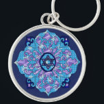 Hanukkah Sleutelhanger<br><div class="desc">Blauwen van alle schoppen,  lila en lavender in een bloesvorm met een zeszijdige ster in het midden is een geweldige manier om Hanoeka te vieren en tegelijkertijd je individualiteit te uiten.</div>