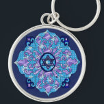 Hanukkah Sleutelhanger<br><div class="desc">Blauwen van alle schoppen,  lila en lavender in een bloesvorm met een zeszijdige ster in het midden is een geweldige manier om Hanoeka te vieren en tegelijkertijd je individualiteit te uiten.</div>