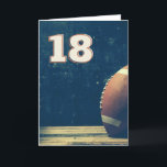 Happy 18th Birthday Football Wenskaart Kaart<br><div class="desc">Het perfecte Birthday-kaartontwerp voor de football speler of ventilator! Vier 18 geweldige jaar met dit afbeelding van een football dat tegen een muur in zachte tonen rust. Een geweldige keepaard. Deze kaart is leeg voor u om uw eigen hartvolle boodschap te schrijven.</div>