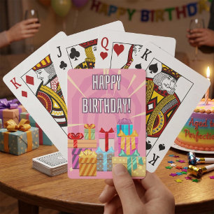 Happy Birthday-cadeautjes op roze speelkaarten
