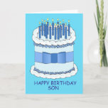 Happy Birthday Son Cartoon Cake and Candles Kaart<br><div class="desc">Een grote cartoon verjaardagstaart met aangestoken kaarsen en de woorden 'Happy Birthday Son' tegen een felblauwe achtergrond.</div>